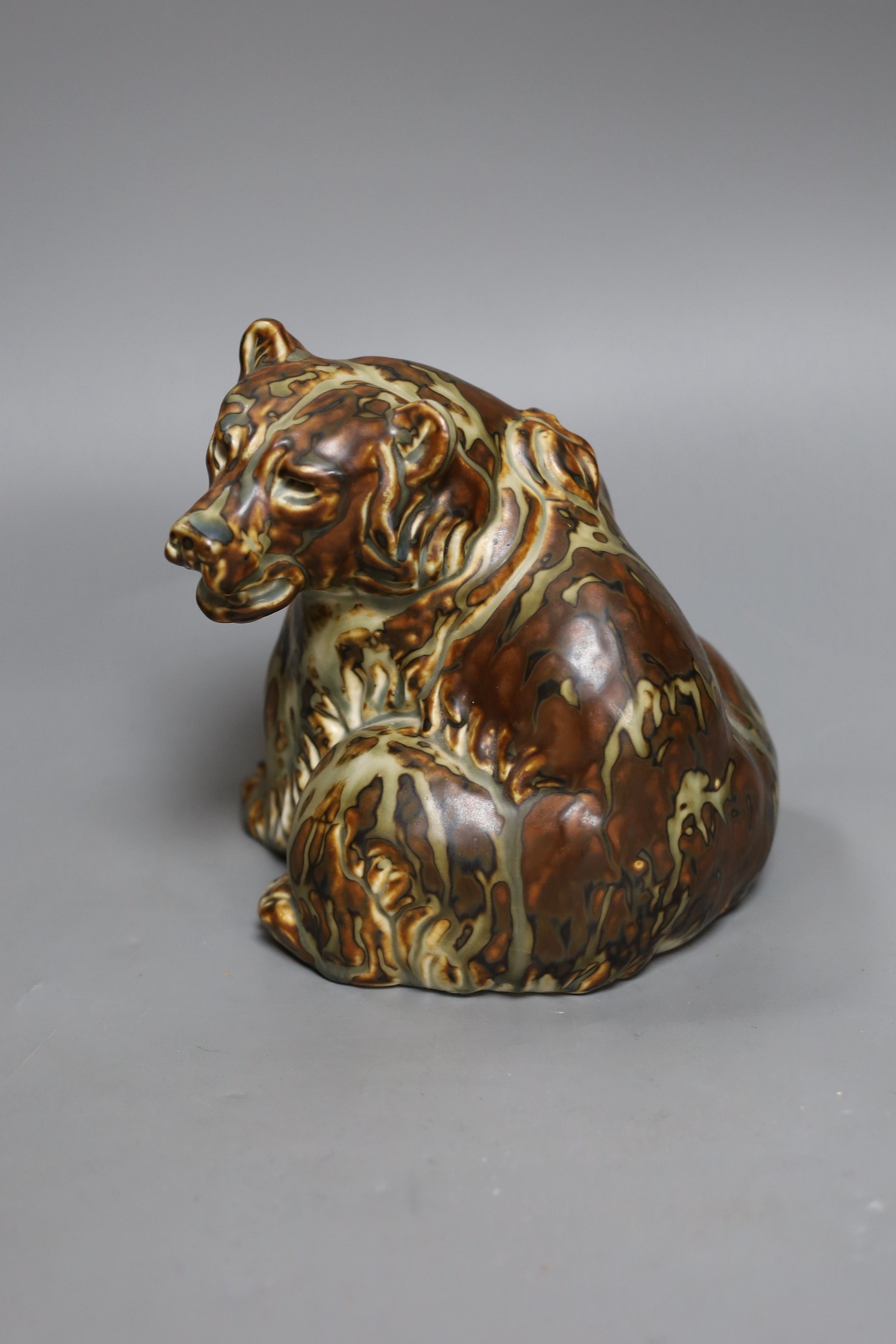 A Royal Copenhagen stoneware model of a bear, marked, M 20208, 17.5cms high